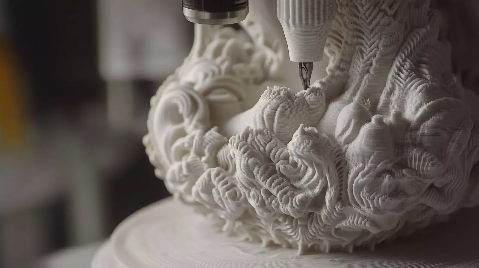 3d printer creating intricate, white, ornate sculpture.